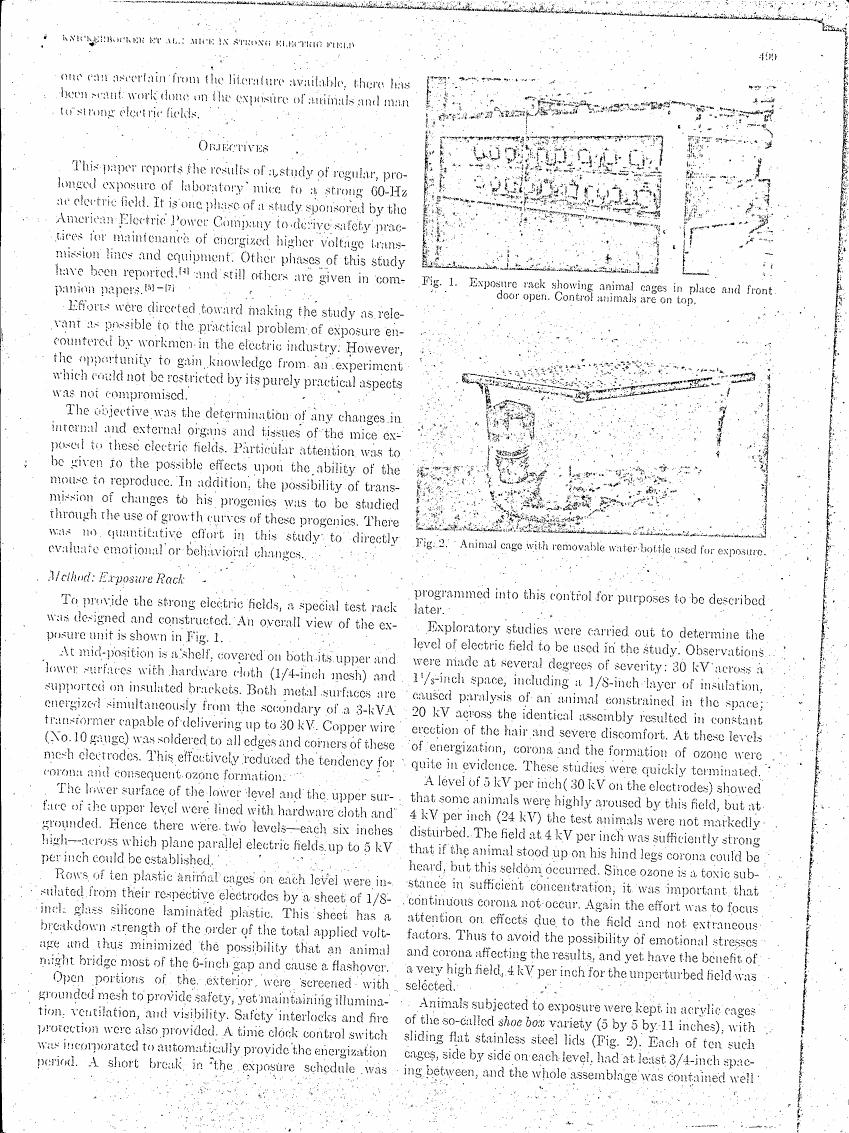 Fig. 1: Exposure rack showing animal cages in place and front door open. Control animals are on top.