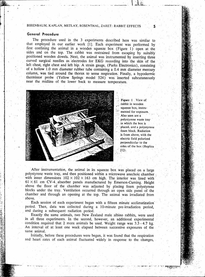 AI-described figure: Figure 1 depicts a view of a rabbit in a wooden squeeze box with various instruments and equipment for exposure to radiation.
