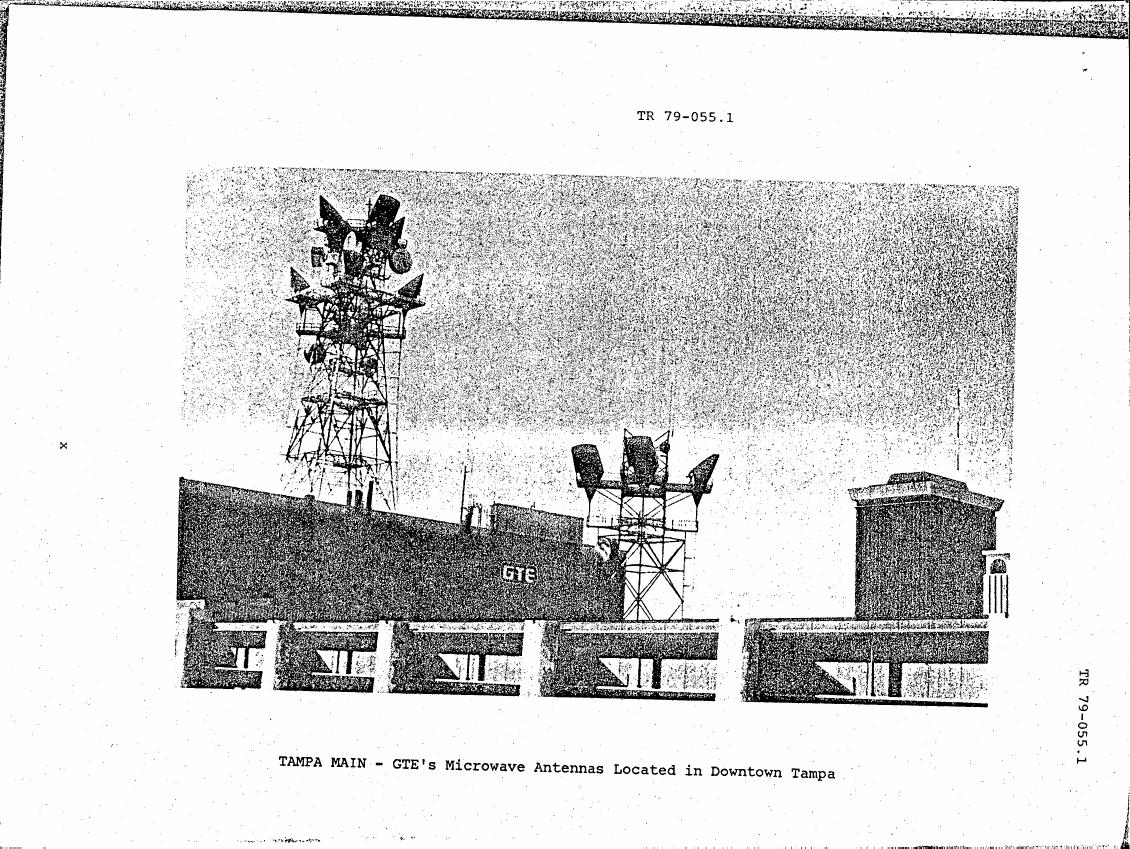 AI-described figure: A photograph showing GTE's microwave antennas located in downtown Tampa.