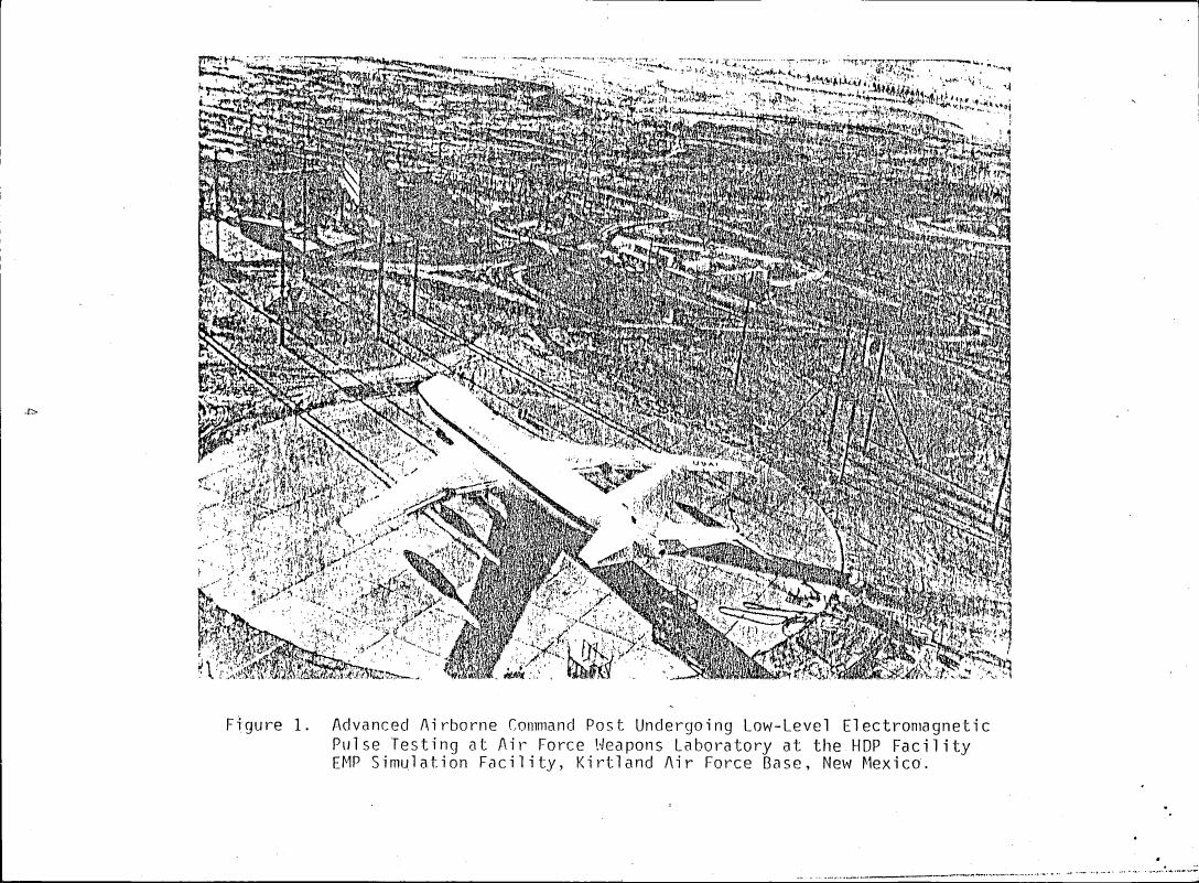 Figure 1. Advanced Airborne Command Post Undergoing Low-Level Electromagnetic Pulse Testing at Air Force Weapons Laboratory at the HDP Facility EMP Simulation Facility, Kirtland Air Force Base, New Mexico.