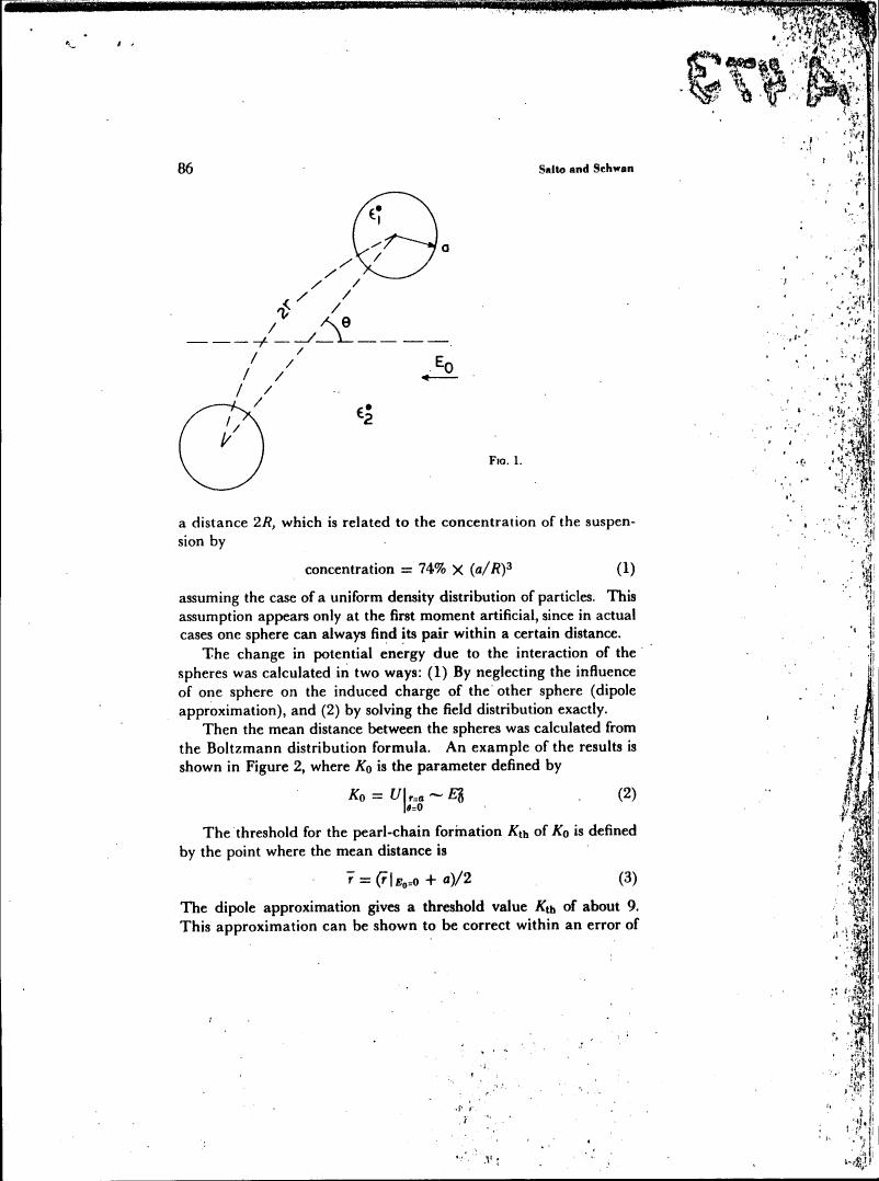 AI-described figure: A diagram illustrating the interaction between two spheres with labeled distances and angles.
